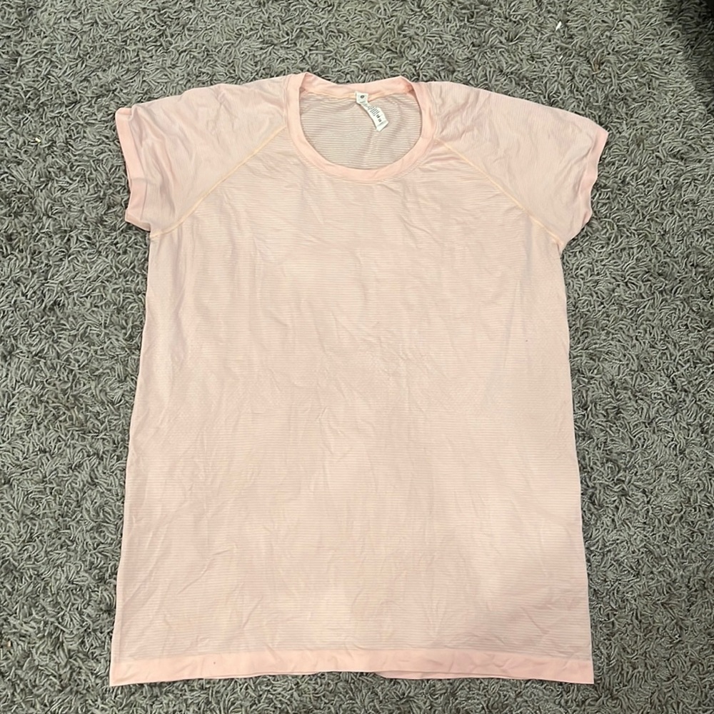 This is a lululemon swiftly tech wrinkled from sitting in my drawer worn once!